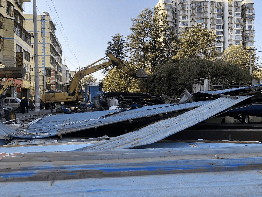 

拆除旧货市场耗资50万元拆除一小区的高空违建要花160万元(图10)