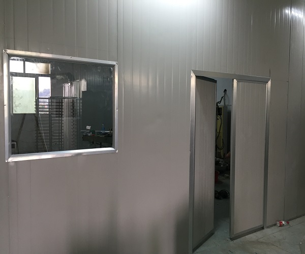 无锡超强筑工程有限公司引进全自动彩钢夹芯板生产流水线(组图)(图1)