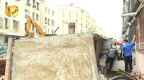 社区办公室联合青山区城市管理综合执法局集中拆除春光小区13号违建(图13)