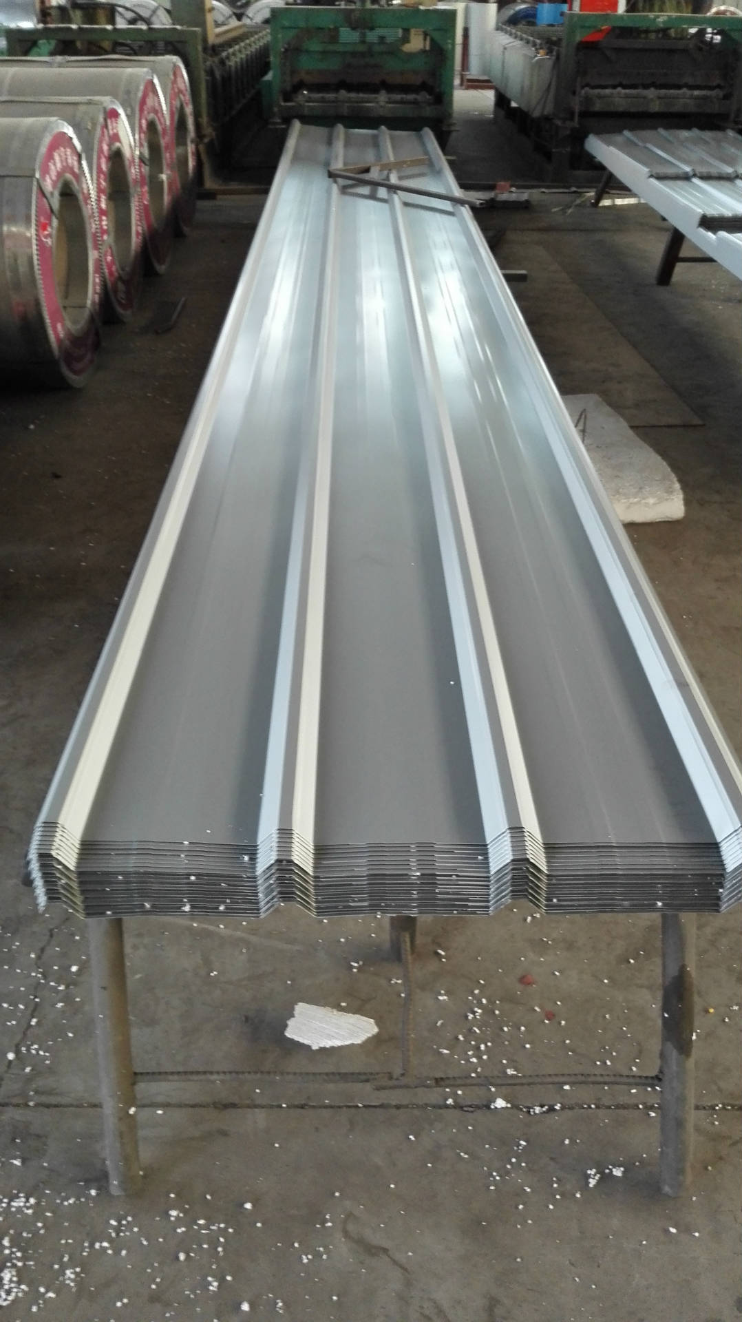 泊头市众腾压瓦机厂了解到随着经济危机的到来(图1)